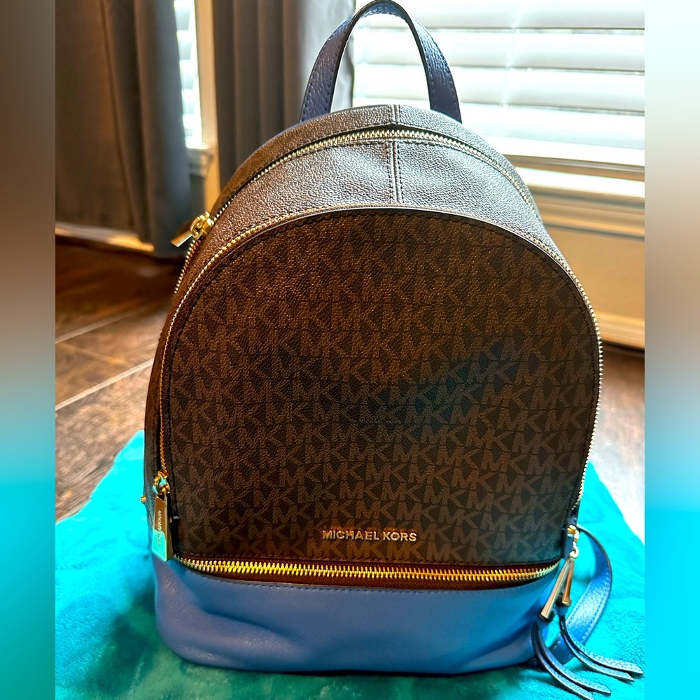 Michael Kors Rhea Medium Logo Backpack. Worn 2 times. Like NEW. Still has tag